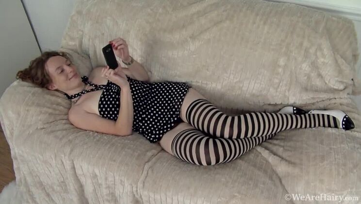 Redhead Ana Molly's Stockinged Solo Pleasure on the Sofa