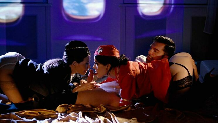 Uniformed Women in Threesome Action